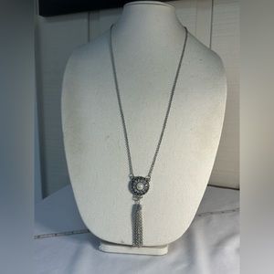 Long silvertone rhinestone and tassel GS necklace
